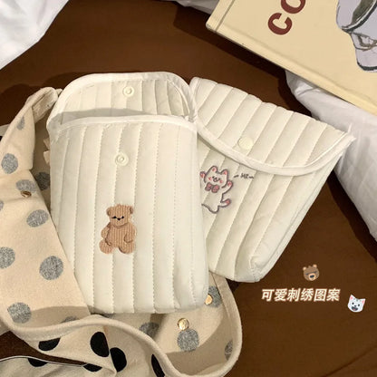 La pochette de rangement